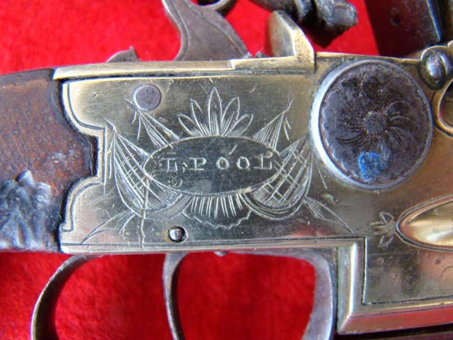 A fine pair of British flintlock pistols with brass over and under barrels with folding bayonets by L.Samuel of Liverpool circa 1780-1800. — image 3